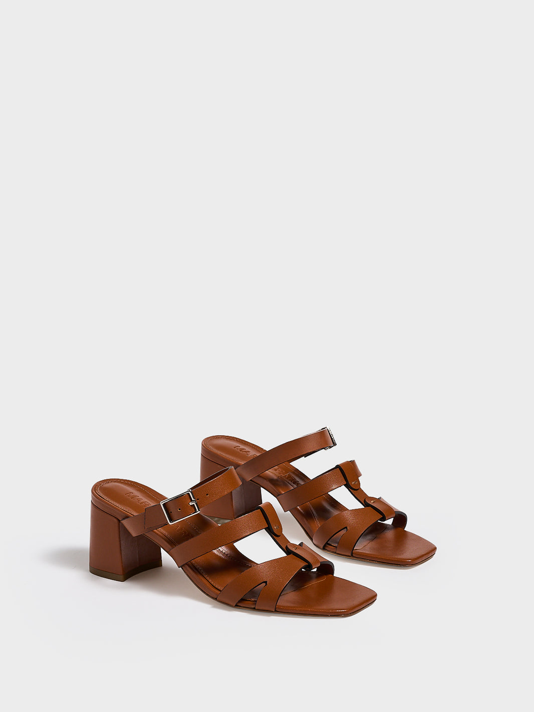 Angle view of a pair of chestnut leather gladiator block heel sandals.
