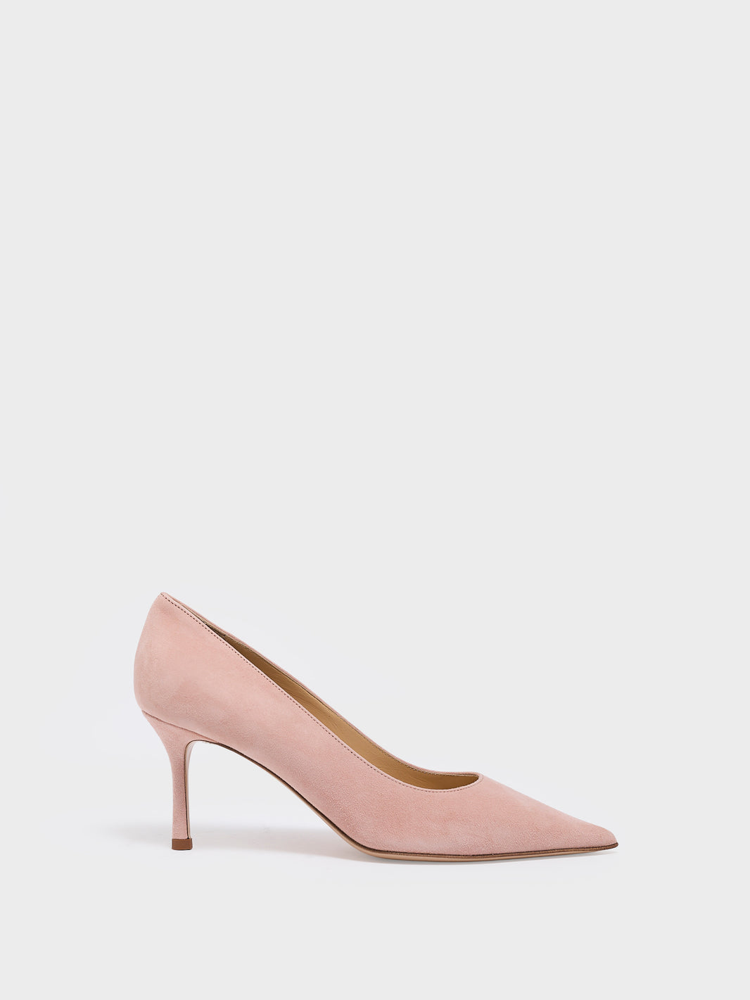 Profile view of a powder suede stiletto heel pump with a pointed toe.